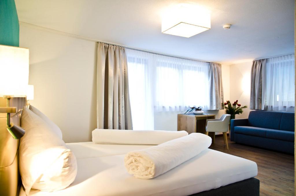 Hotel Garni Alpenland Ишгъл Стая снимка