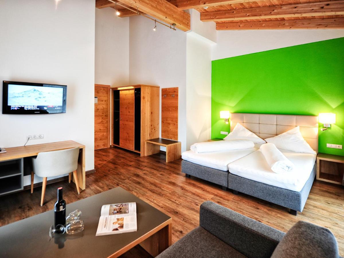 Hotel Garni Alpenland Ишгъл Екстериор снимка